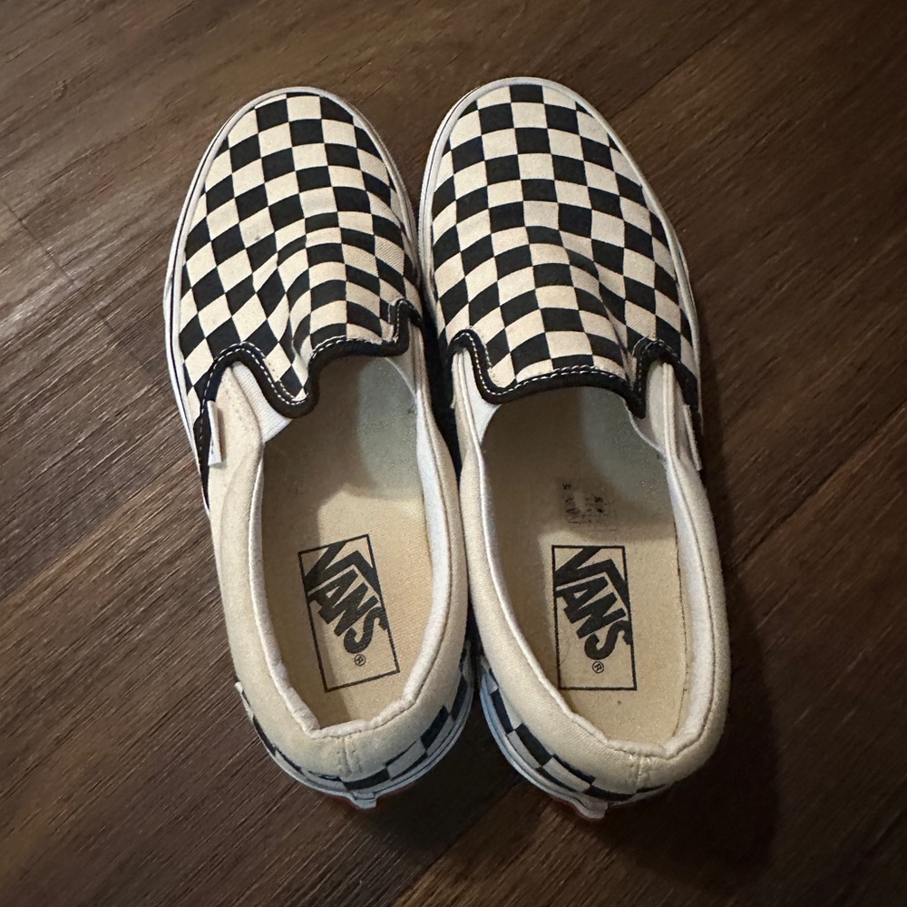 Vans woman’s Black and White Checkered Slip-On Sneakers